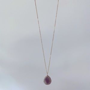 Francesca’s purple pendant and gold long necklace